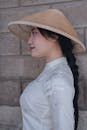Profile of Woman in Traditional Vietnamese Hat