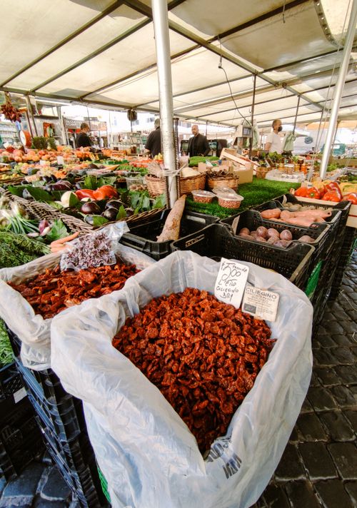 Free Explore the colorful produce and atmosphere of Rome's Campo de' Fiori market. Stock Photo