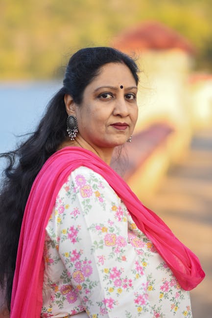 Elegant portrait of a woman wearing traditional Indian attire in Topchanchi, India.