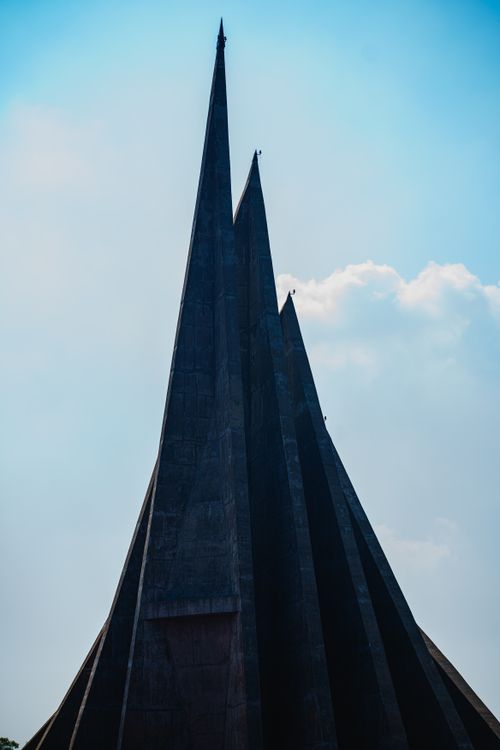 Free Striking view of the National Martyrs’ Memorial in Bangladesh under a clear blue sky. Stock Photo