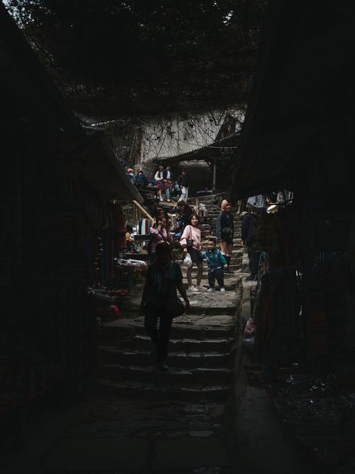 Free People navigating a busy market in Lào Cai, Vietnam, showcasing vibrant local culture. Stock Photo