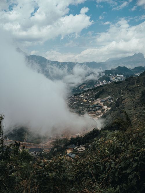 Free Serene misty mountain view in Lào Cai, Vietnam under a cloudy sky. Stock Photo