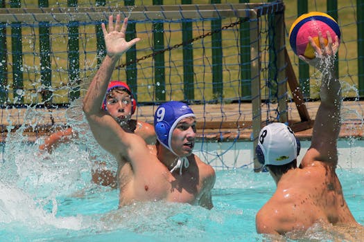 Three male athletes engaging in a dynamic water polo game highlighting sportsmanship and competition.