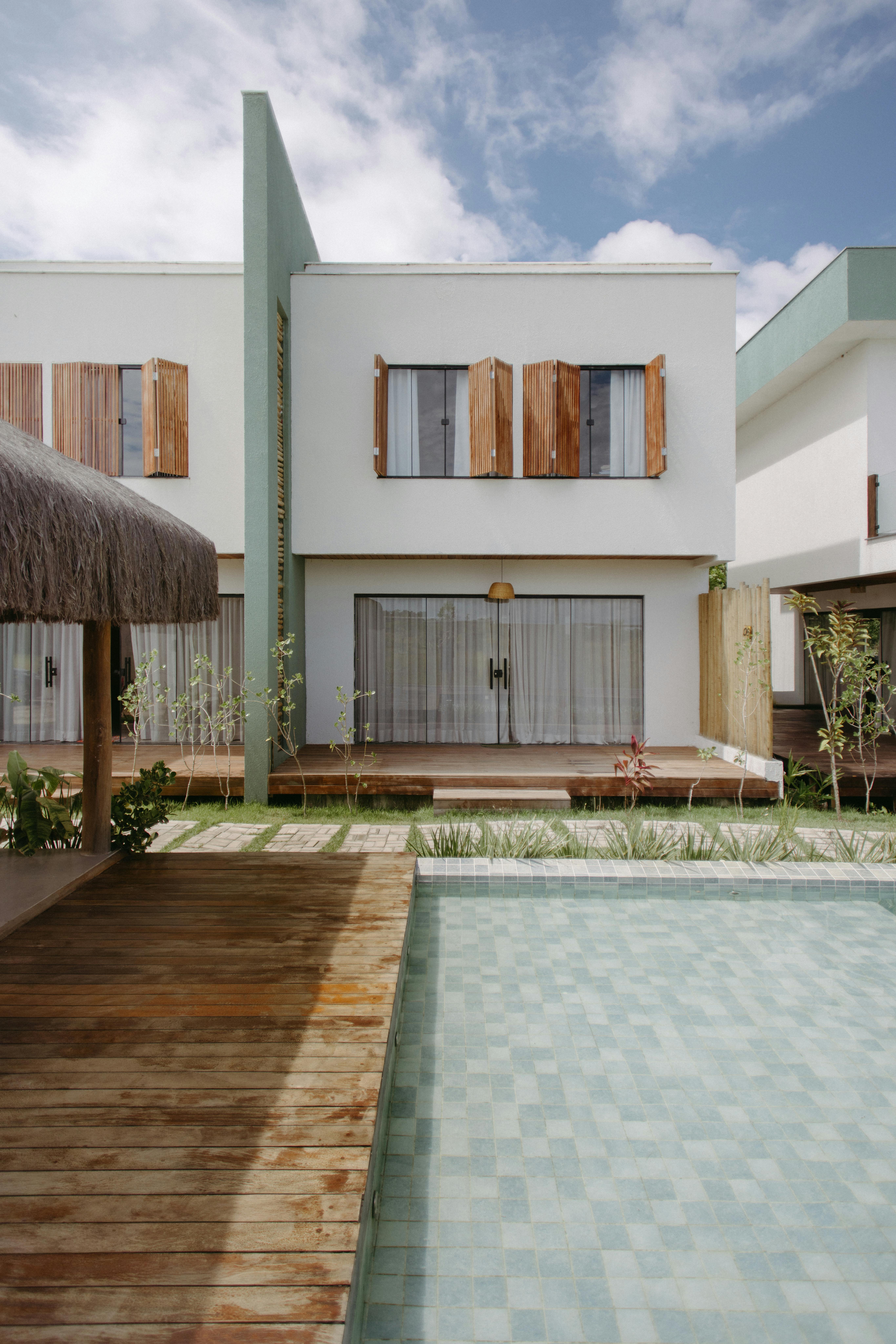 Free Contemporary architecture featuring a pool and patio in Bahia, Brazil. Ideal vacation spot. Stock Photo