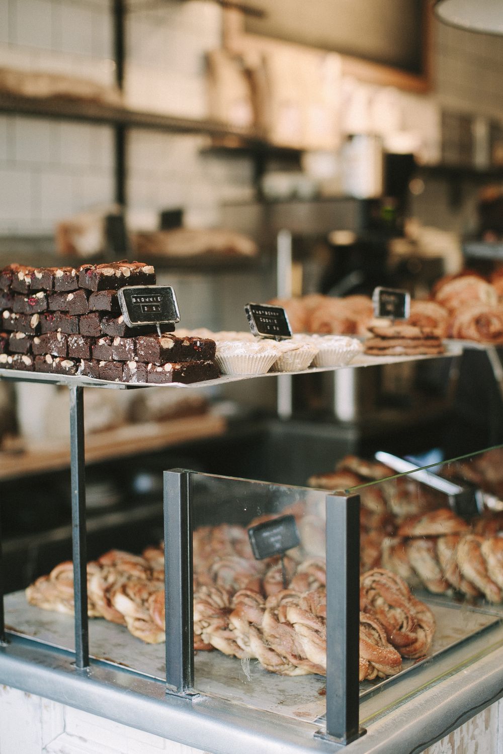 Assorted pastries displayed on a bakery counter