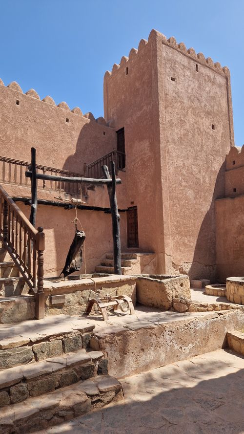 Free Historic mud-brick fort with traditional desert architecture, clear blue sky in the background. Stock Photo