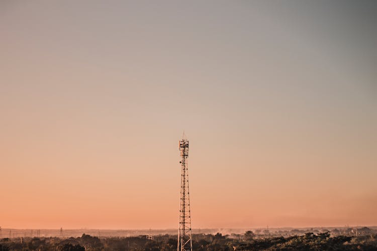 Broadcasting Tower Under Cloudless Sundown Sky