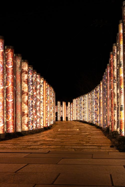 Free Beautiful illuminated pillars along the path at night in Arashiyama, Kyoto, Japan. Stock Photo