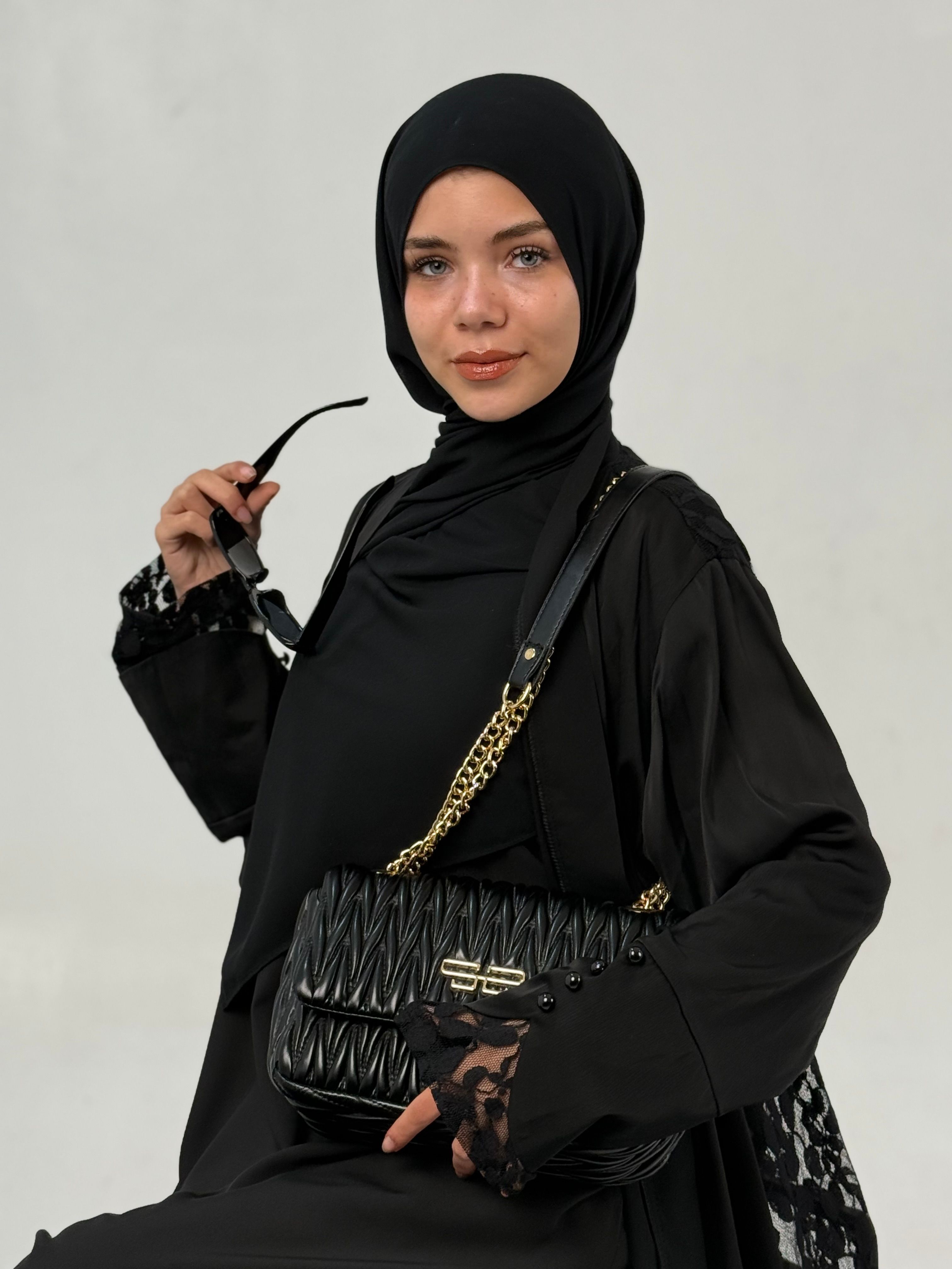 Elegant Portrait of Woman in Black Hijab · Free Stock Photo