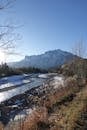 Scenic Winter River and Mountain Landscape