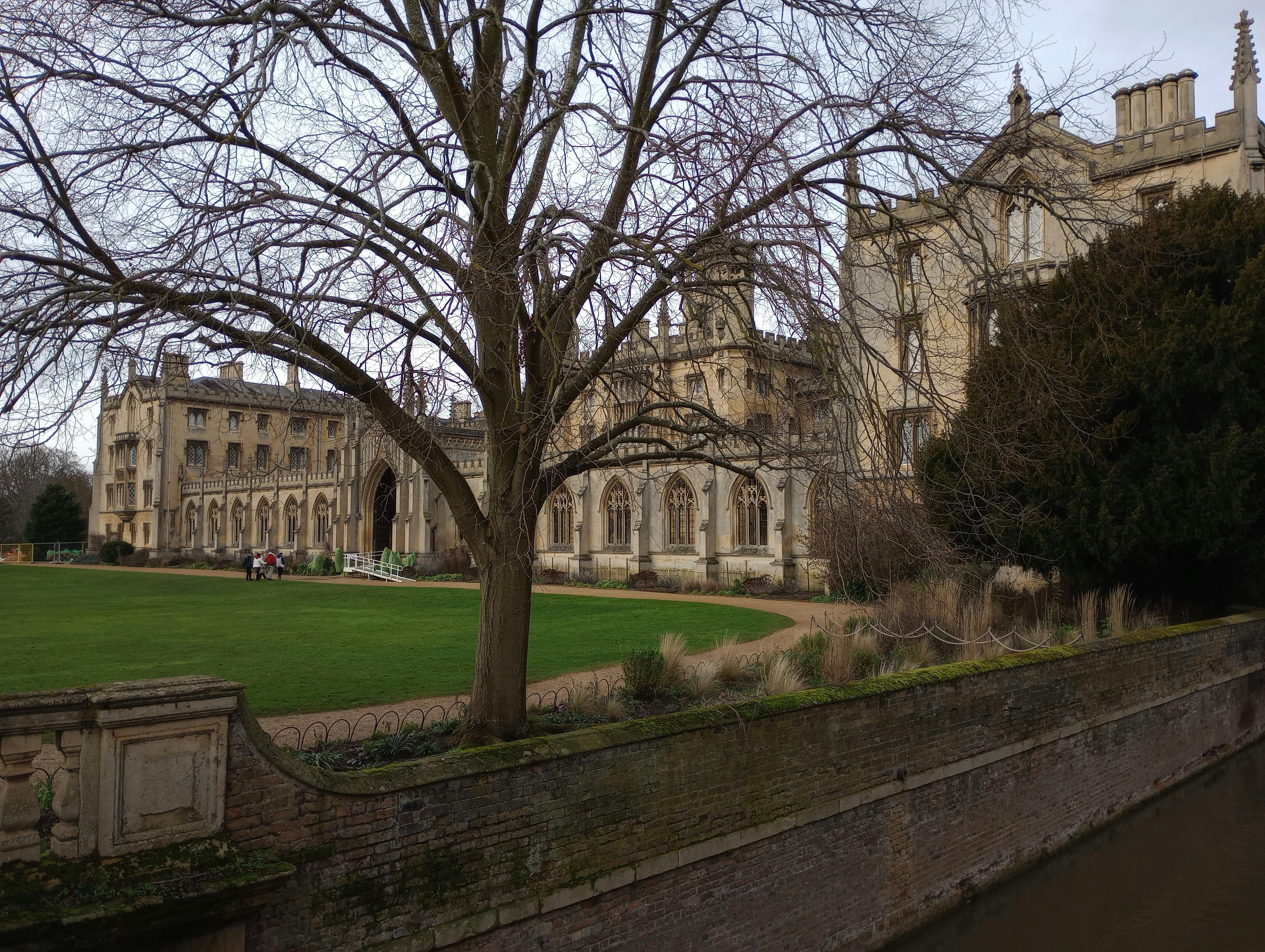 Majestic view of a historic college building in Cambridge, UK during winter.