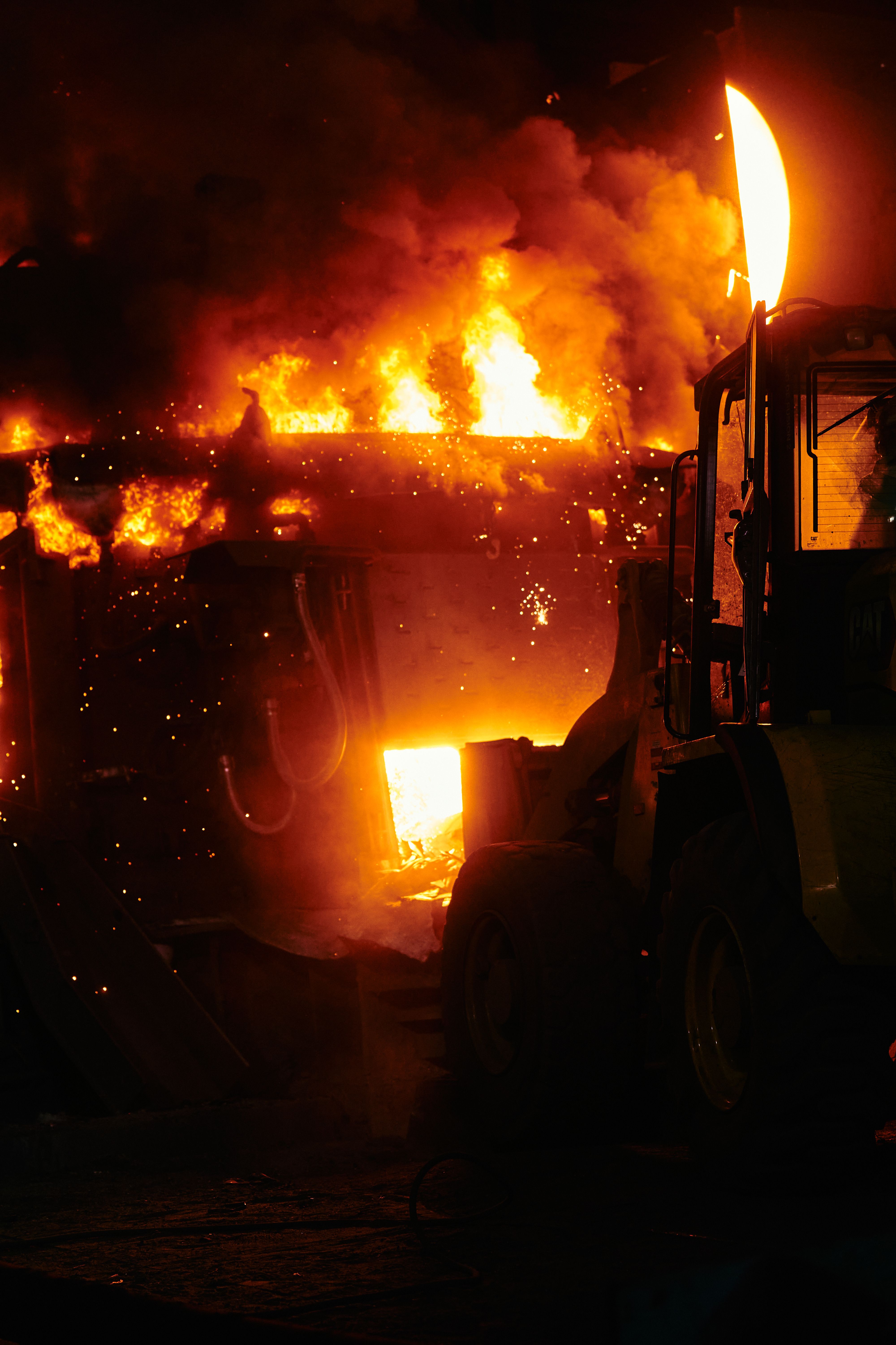Industrial Fire Scene with Excavator at Night · Free Stock Photo