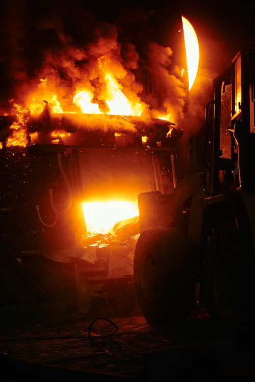 Dramatic Industrial Fire Scene at Night · Free Stock Photo