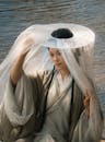 Traditional Chinese Woman in Hanfu by Water