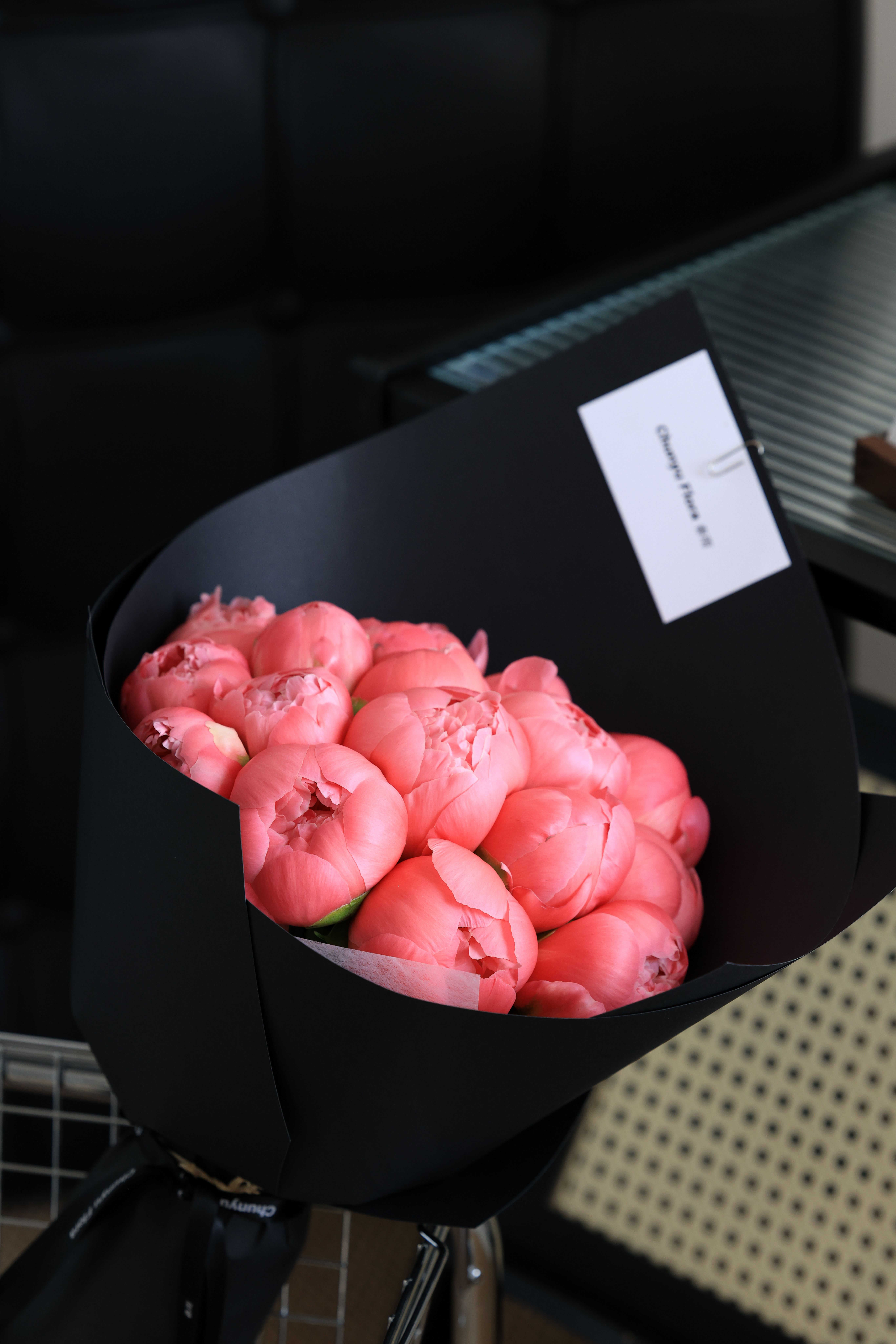 Hand-tied bouquet being wrapped by a florist in Istanbul