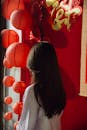 Girl in White at Vibrant Lunar New Year Decoration