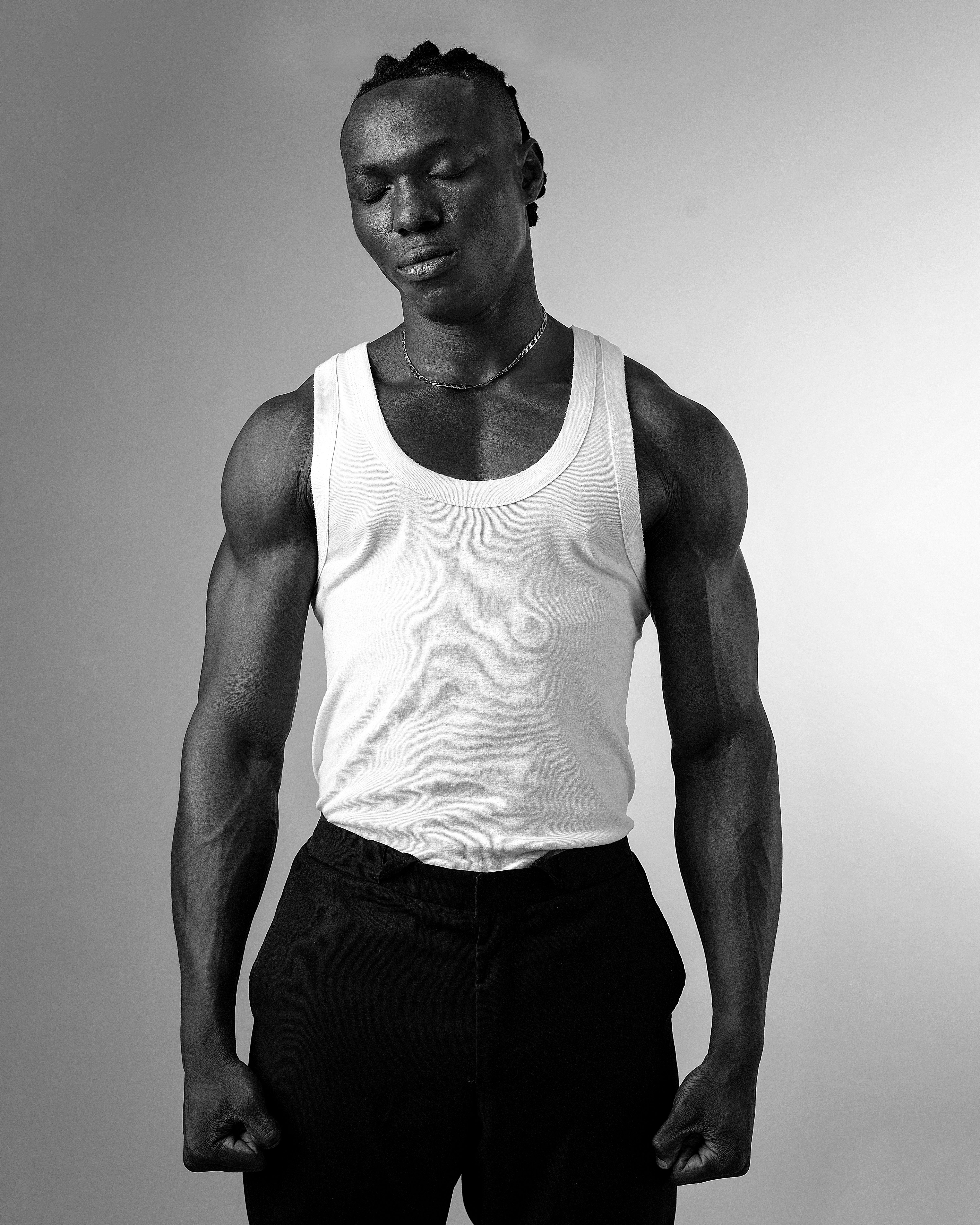 Black and White Portrait of a Muscular Man · Free Stock Photo