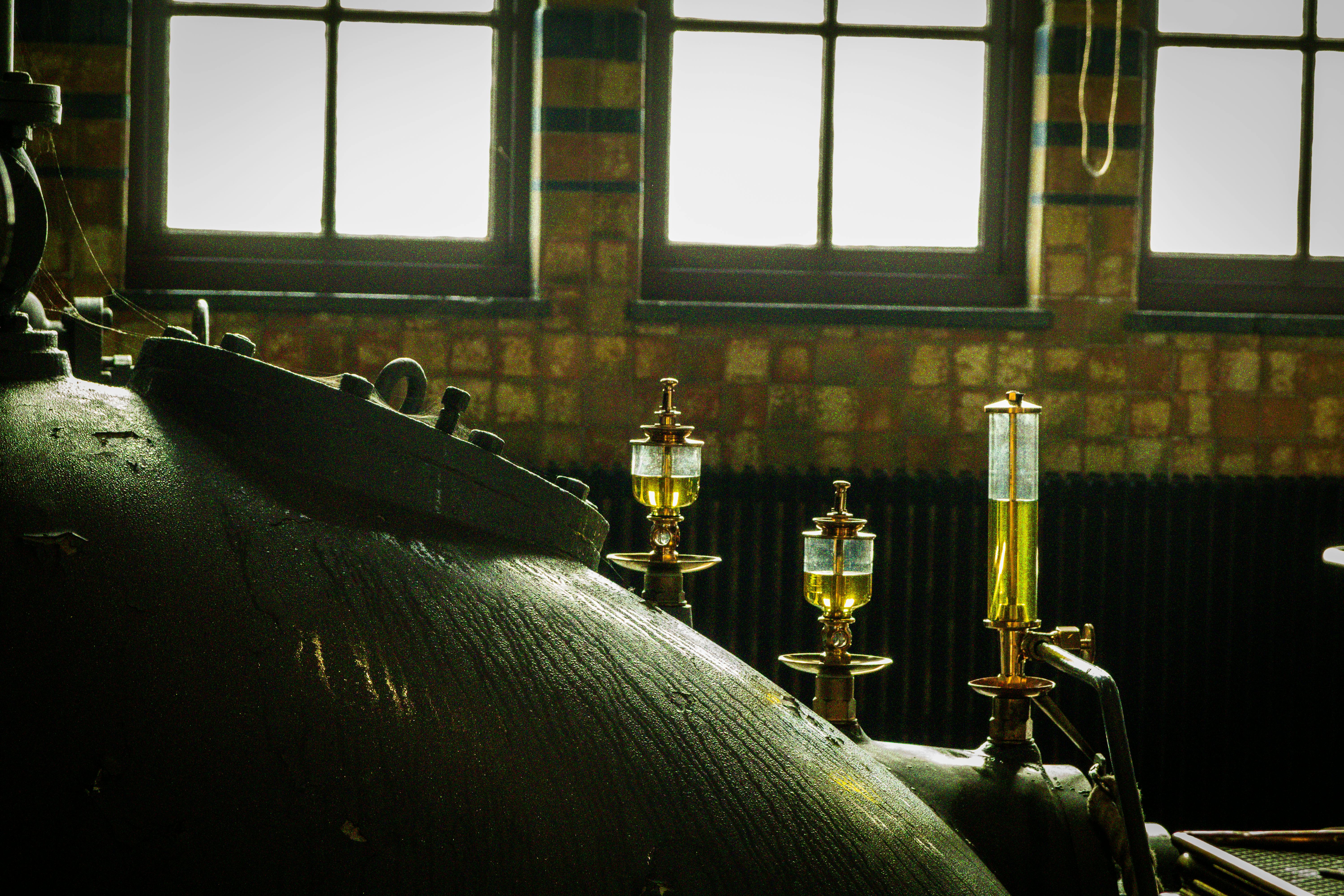 Close-up of vintage industrial machinery in an old factory setting.