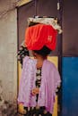 Traditional Nigerian Woman Balancing Items