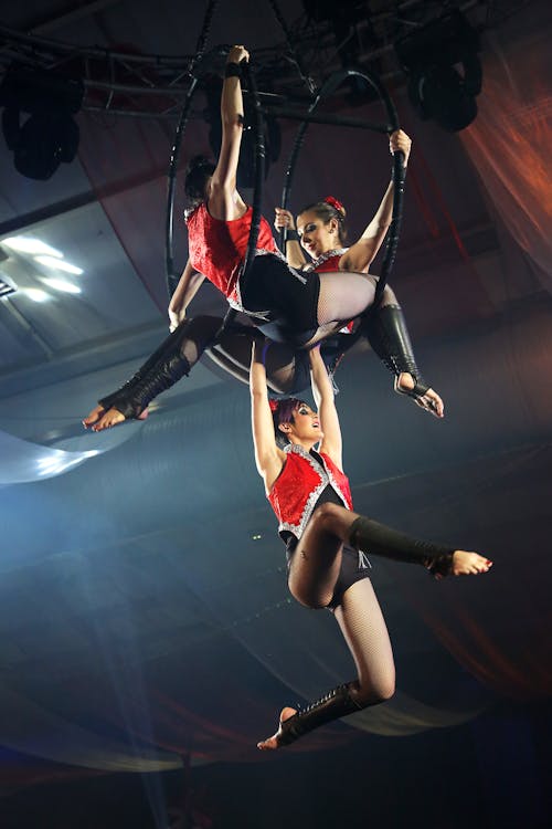 3 Women in Red and Black Circus Costume 