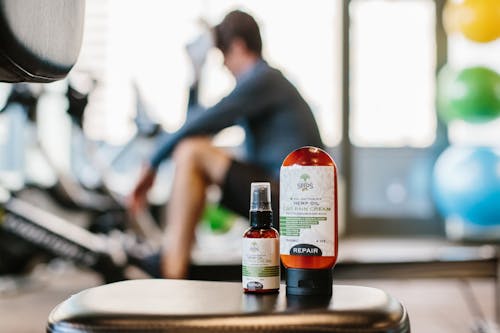 White Labeled Bottle on Brown Table