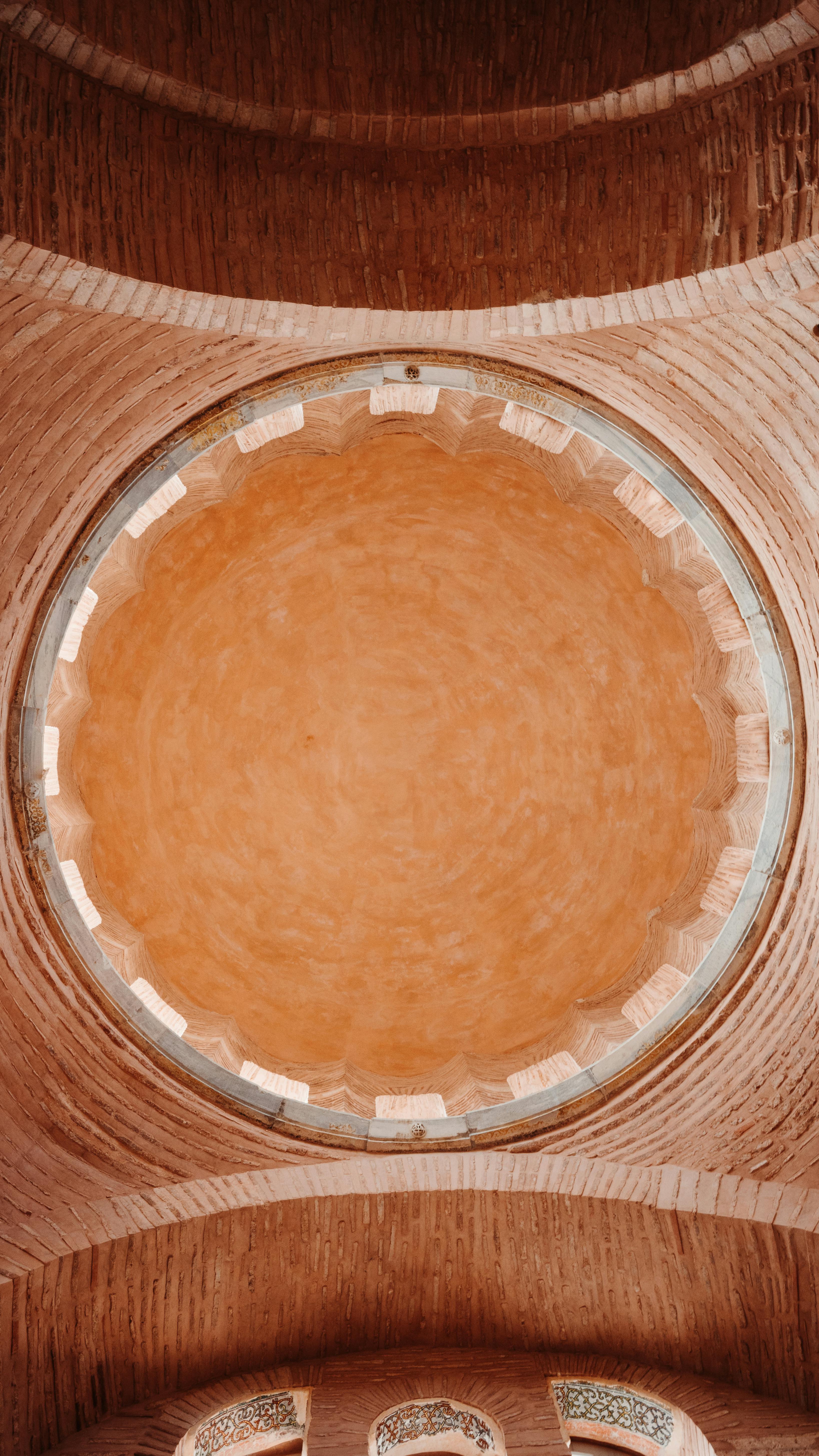Free Captivating view of a dome ceiling in Istanbul showcasing intricate architectural details and warm tones. Stock Photo