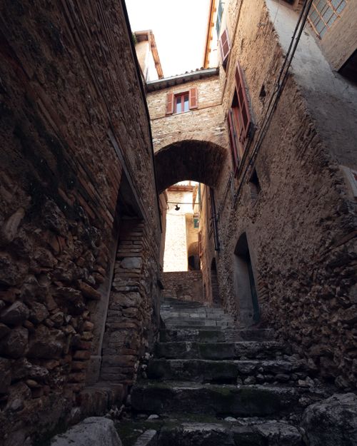 Free Explore the quaint stone alleyways of an Italian village with rustic charm. Stock Photo