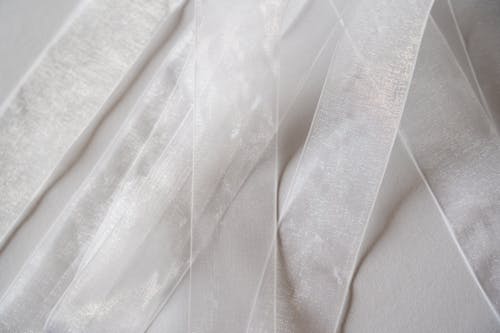 White and Gray Textile