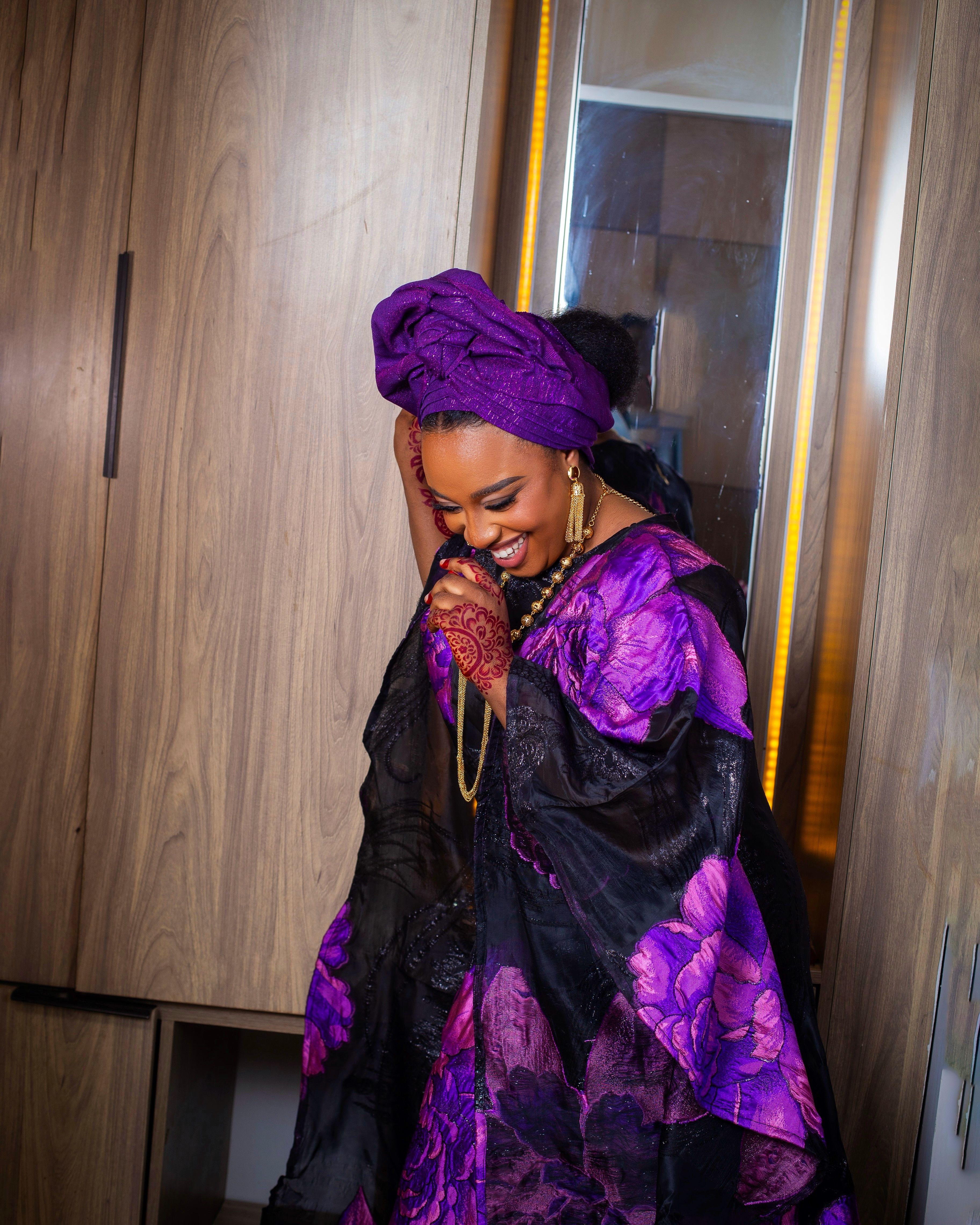 Joyful African Woman in Traditional Attire · Free Stock Photo