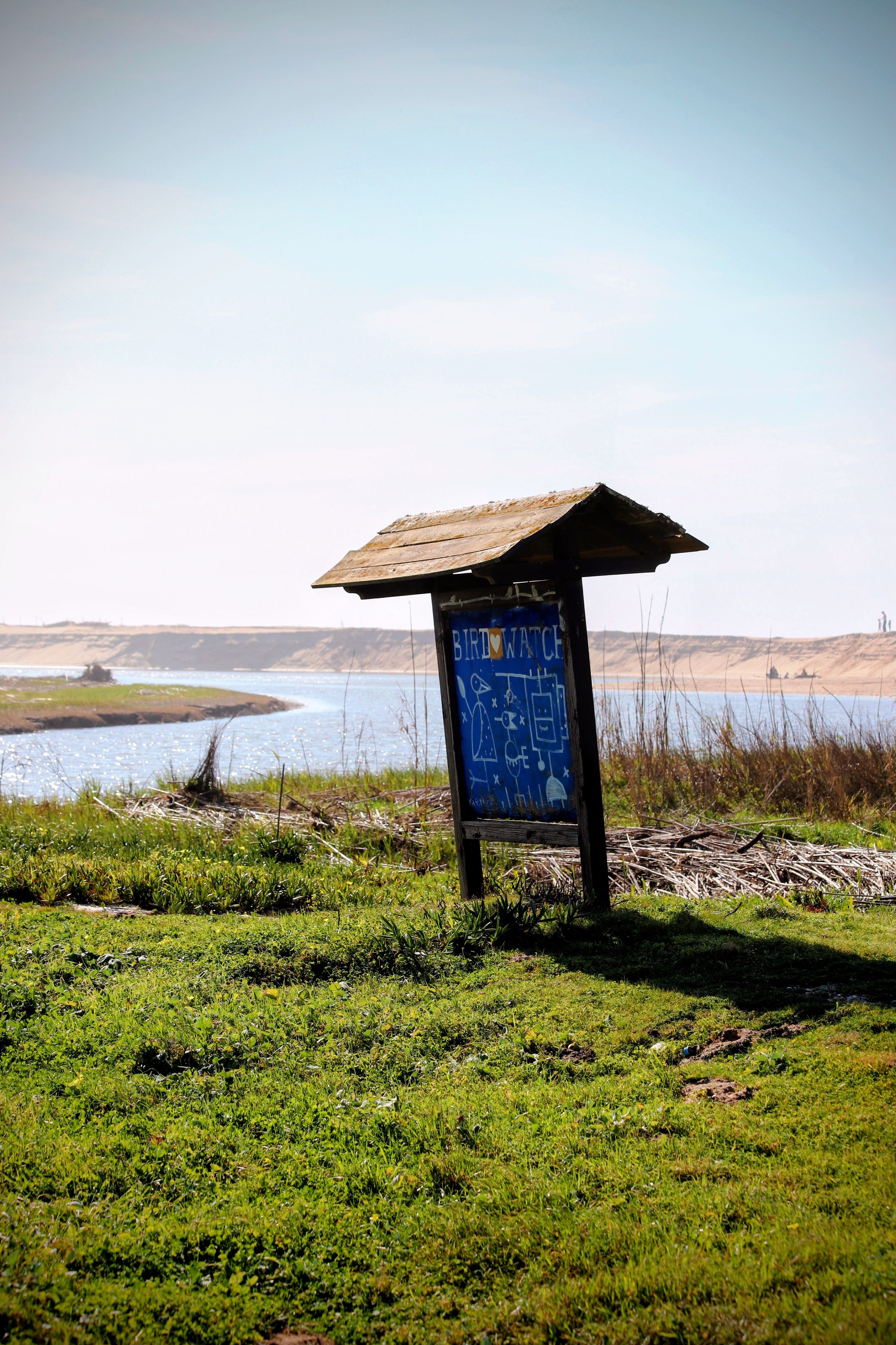 Scenic Riverside Birdwatching Sign in Nature · Free Stock Photo