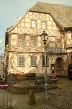 Charming medieval half-timbered house in Лор-на-Майне, Bavaria, Germany.