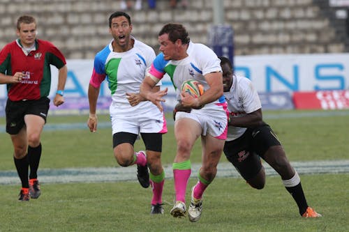 Men Playing Rugby