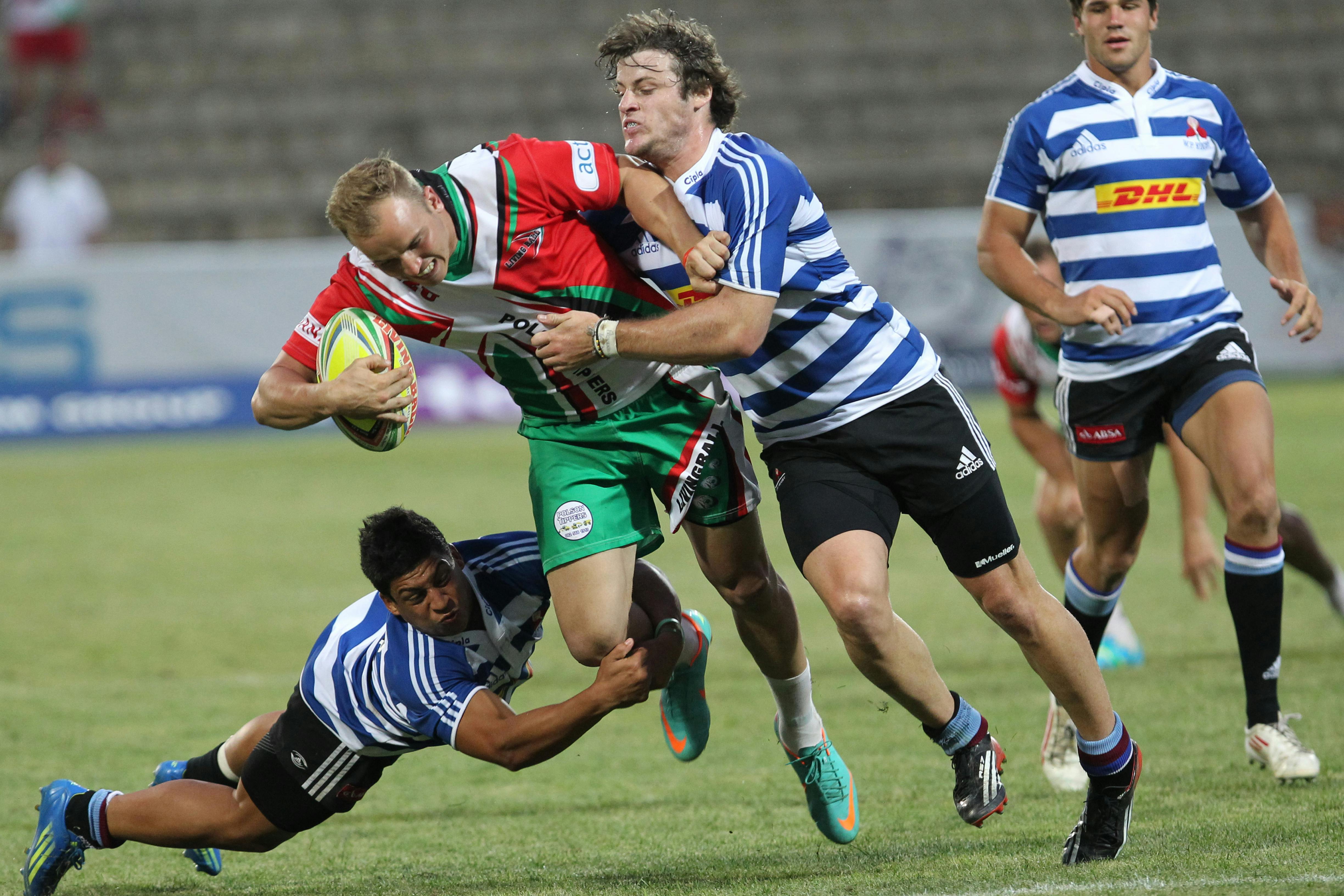 Group of men playing rugby. | Photo: Pexels