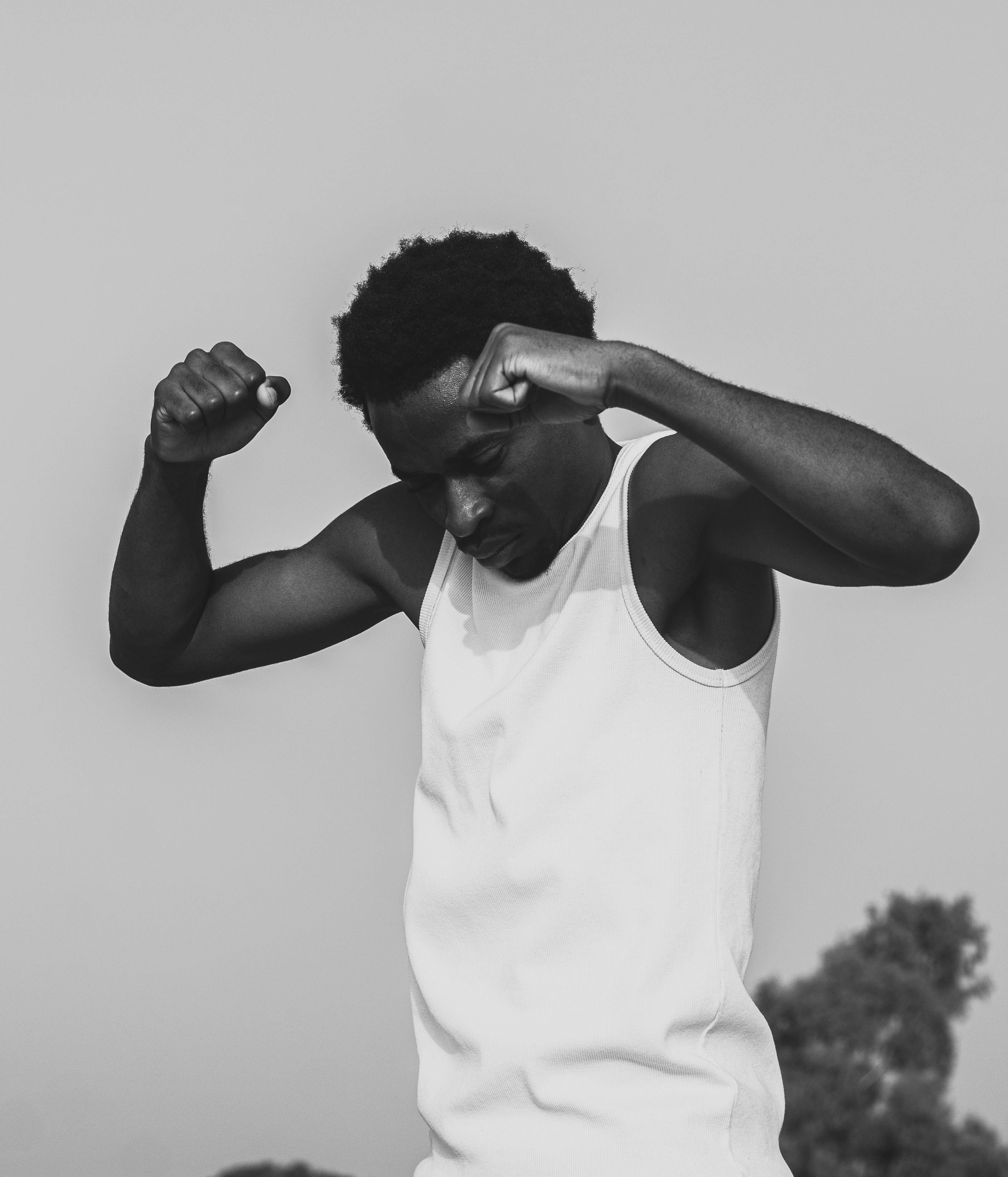 Black and White Portrait of a Man in Motion · Free Stock Photo