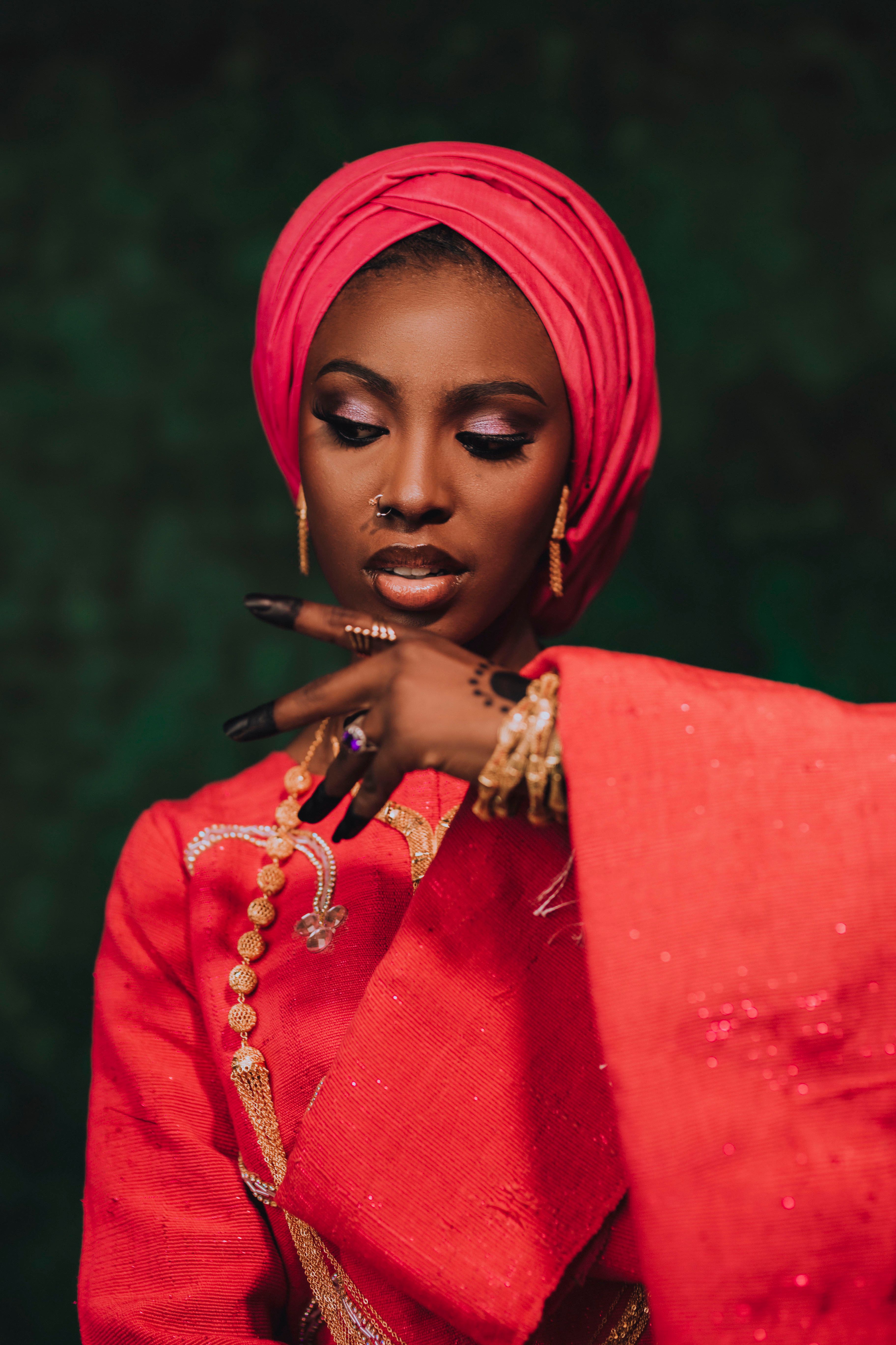 Elegant Portrait of Woman in Red Traditional Attire · Free Stock Photo