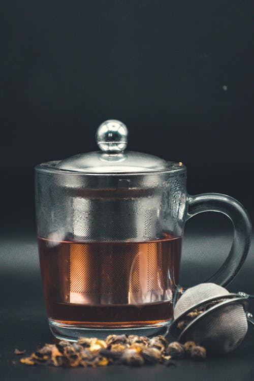 Clear Glass With Brown Liquid