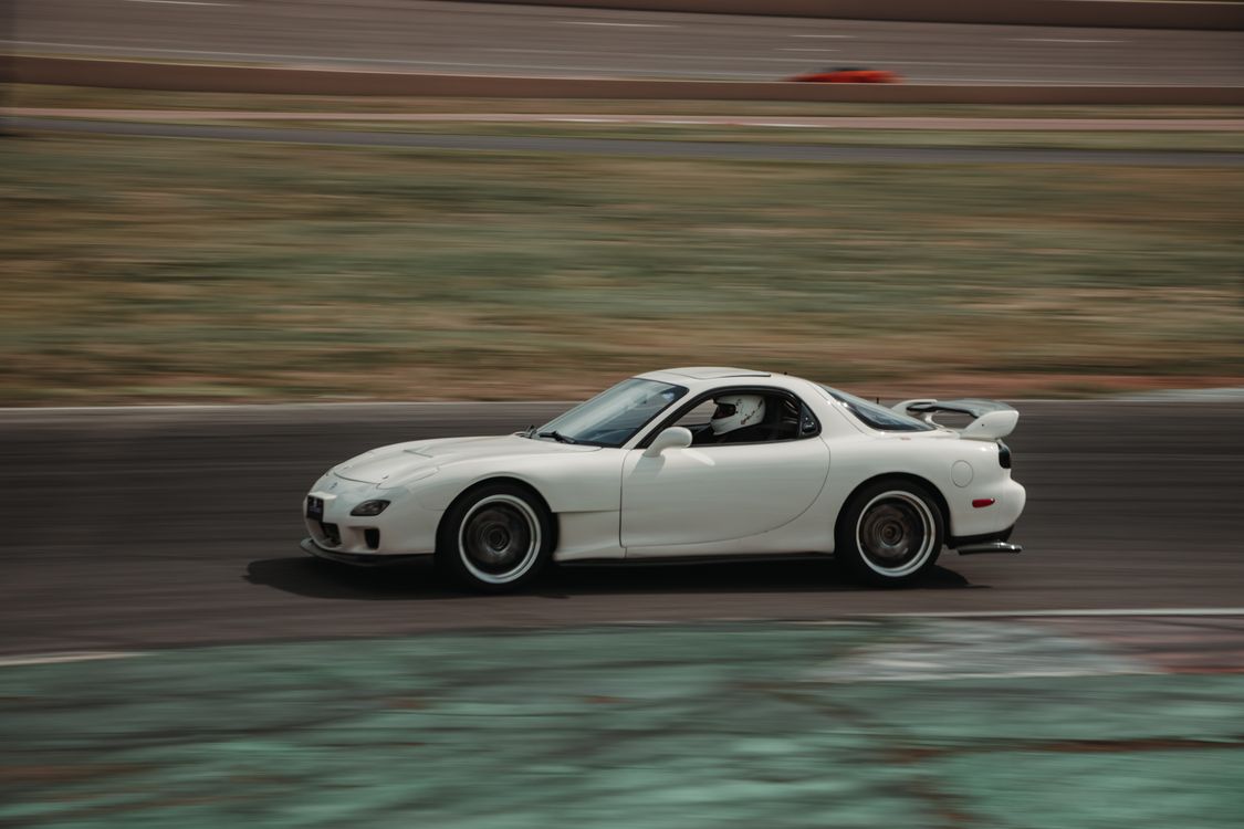Dynamic Mazda RX-7 in High-Speed Drift Action · Free Stock Photo