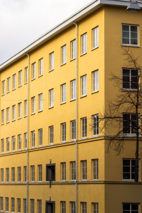 Free Bright yellow facade of a historic building in Jönköping, Sweden, capturing urban architecture. Stock Photo