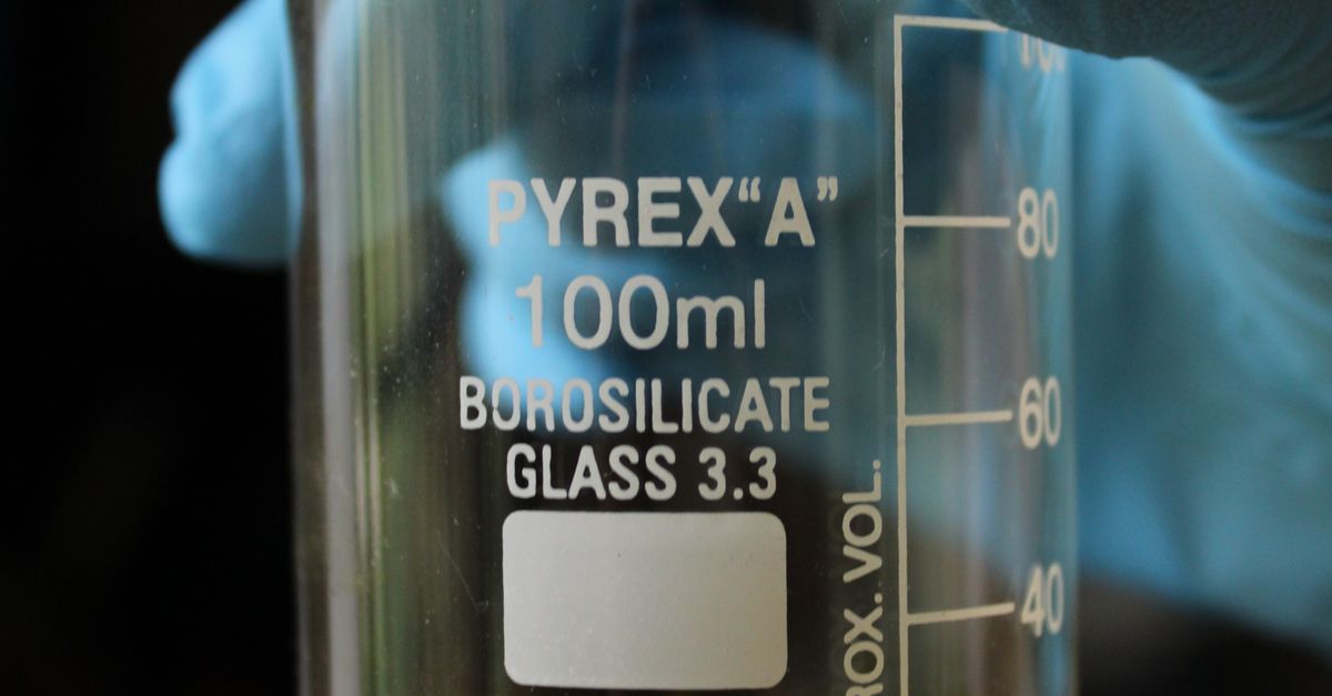 Syringe Pyrex Lab Lab Technician Holding Pyrex Beaker with Liquid · Free Stock Photo