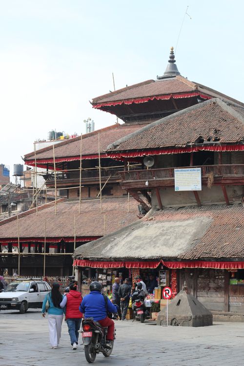 Free Traditional Nepalese architecture in Kathmandu's bustling streets. Stock Photo