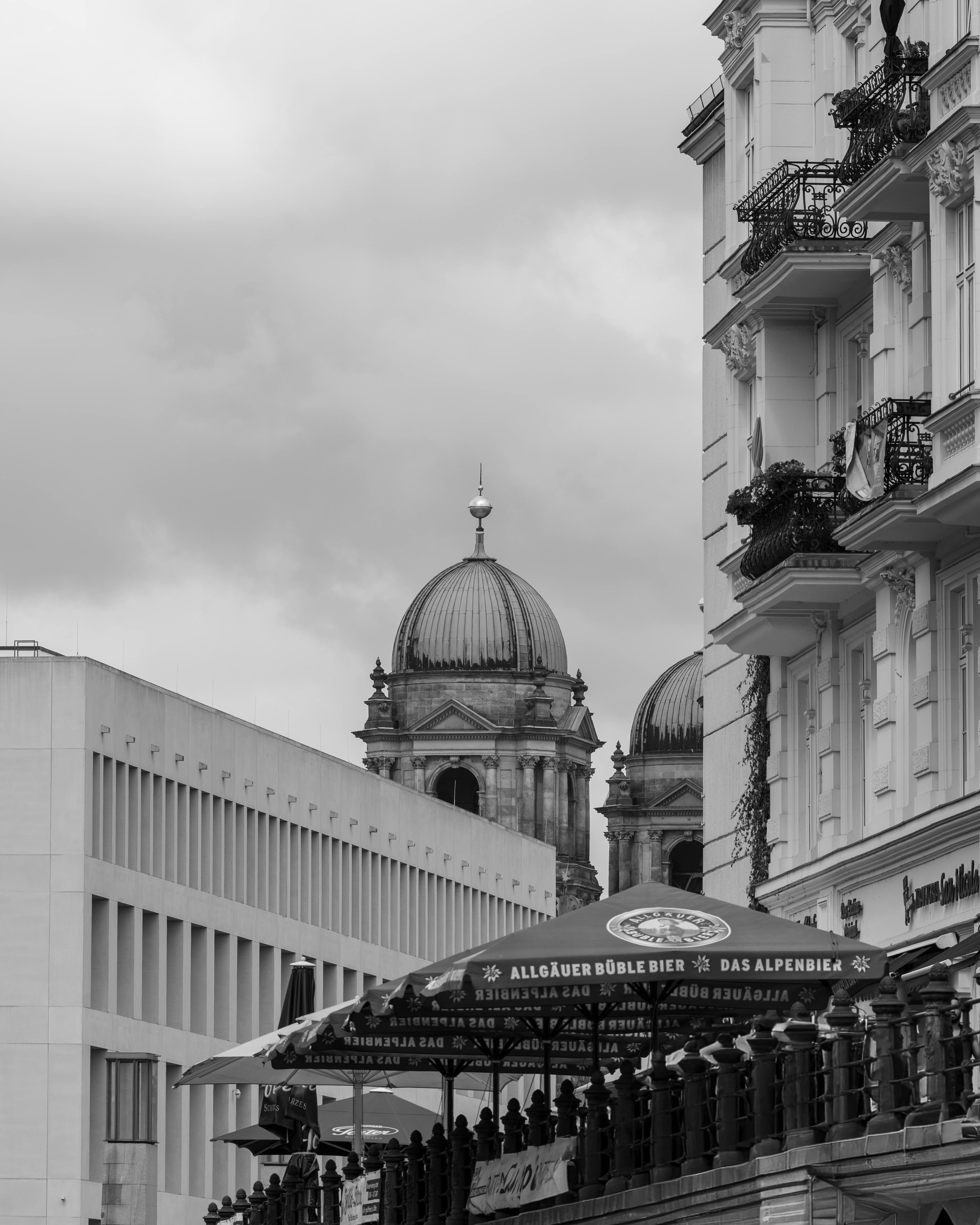 Free Black and white photo capturing Berlin architecture with historic domes. Stock Photo