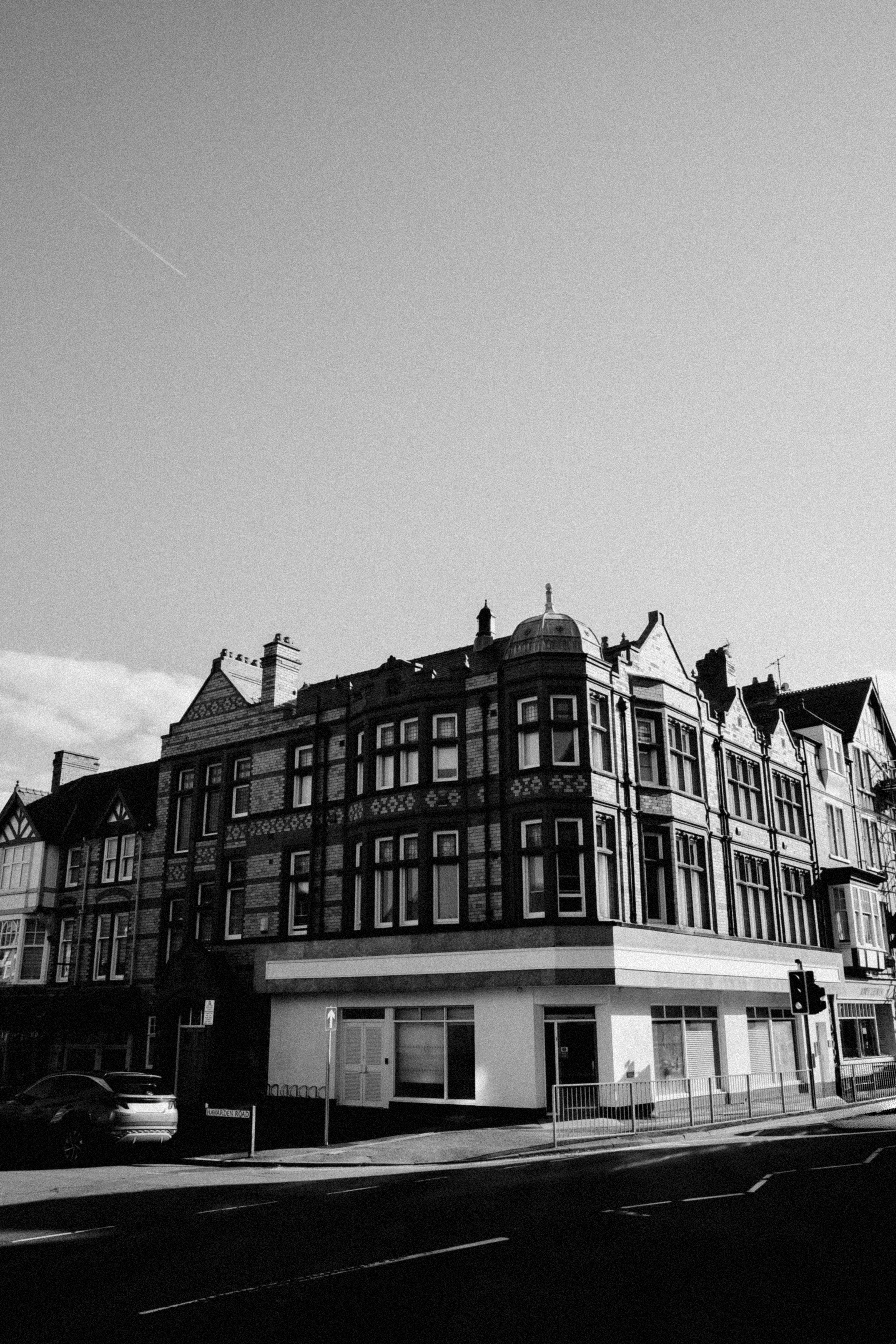 Archival photo of a classic building in Colwyn Bay, Wales, showcasing vintage architecture.