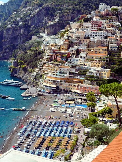Free Colorful hillside town of Positano overlooking the Amalfi coast and beach. Stock Photo
