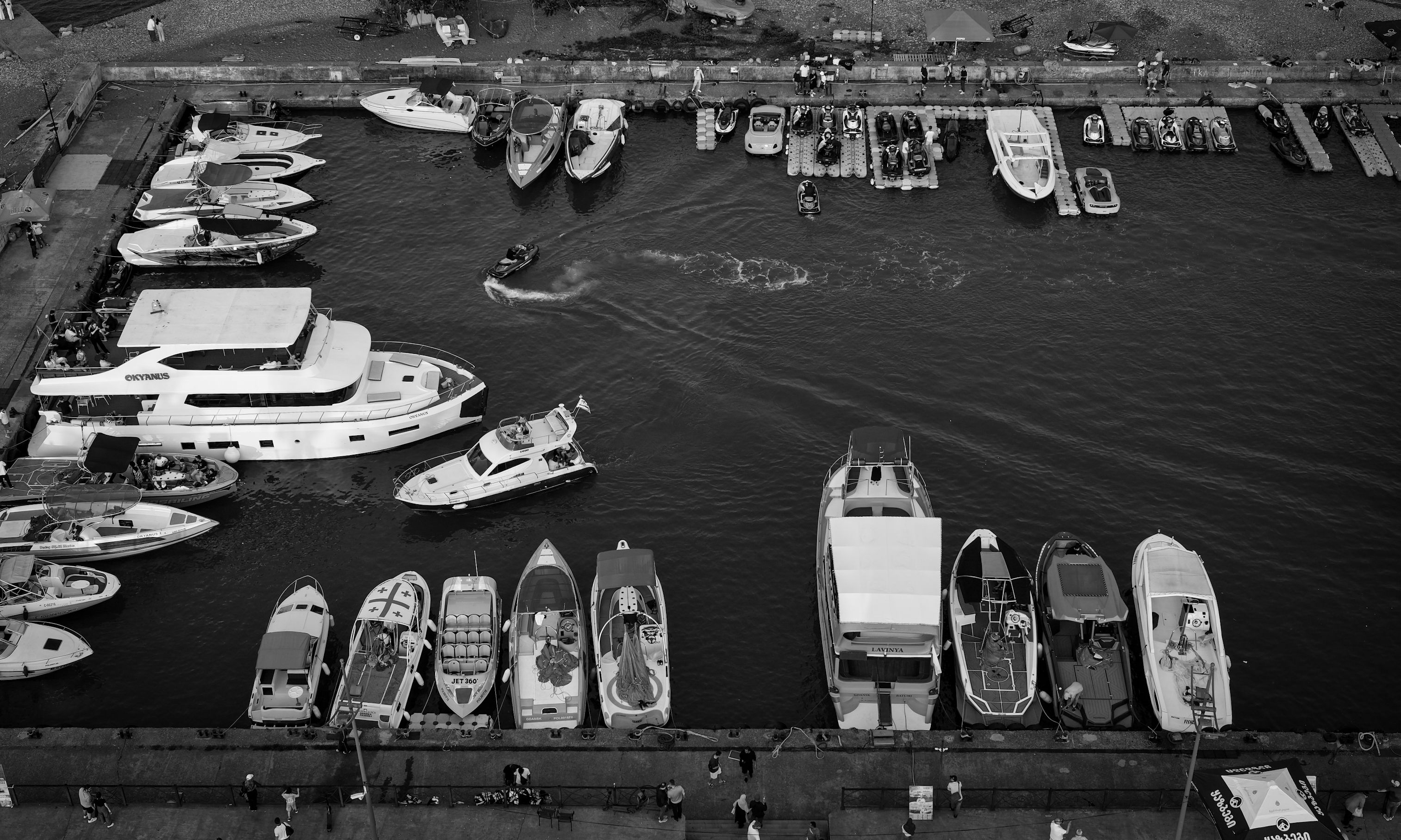 Aerial View of Boats Moored at a Busy Dock · Free Stock Photo