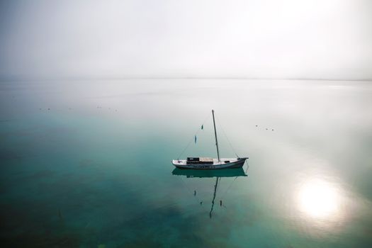 Sailboat on Placid Body of Water