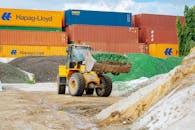 Bulldozer at Glass Recycling Yard in Tanzania