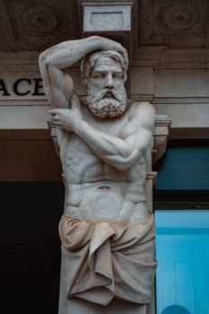 Elegant marble statue depicting a mythological figure, captured in Lugano.