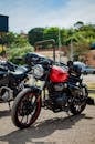 Red Royal Enfield Motorcycle Parked Outdoors