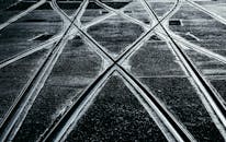 Intersecting Rail Tracks at Dusk