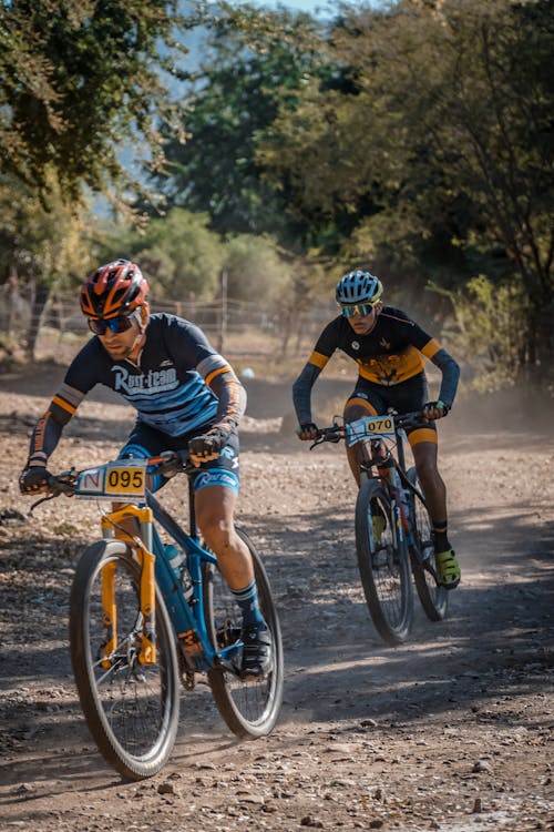 Two Men Riding Bicycle